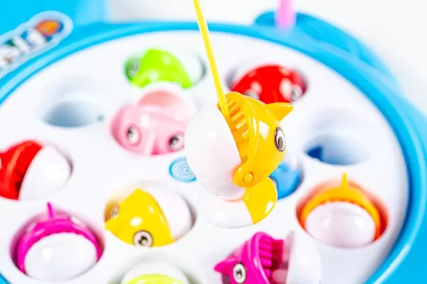 Close up toy fish on a fishing rod