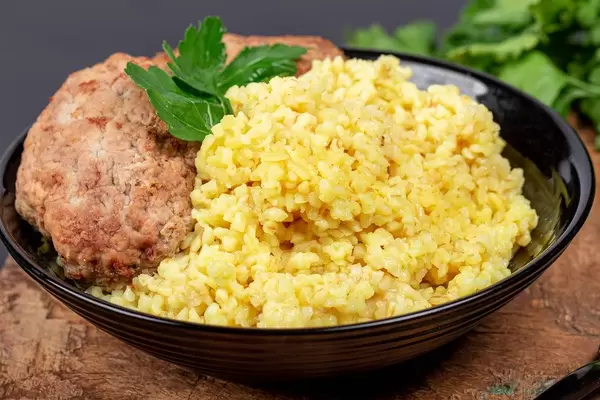 Close- up , wheat porridge with cutlets (Flip 2020)