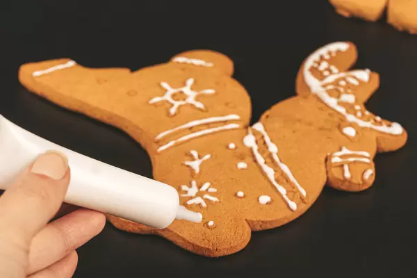 Close-up, white icing and gingerbread in the shape of a deer
