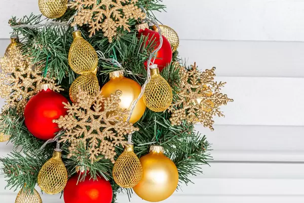 Closeup decorated Christmas tree with garlands and snowflakes (Flip 2019)