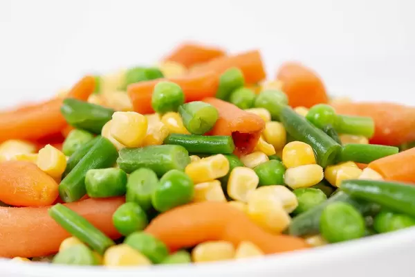 Closeup macro of Fresh raw Carrot Peas Corn and Green Beans (Flip 2019)