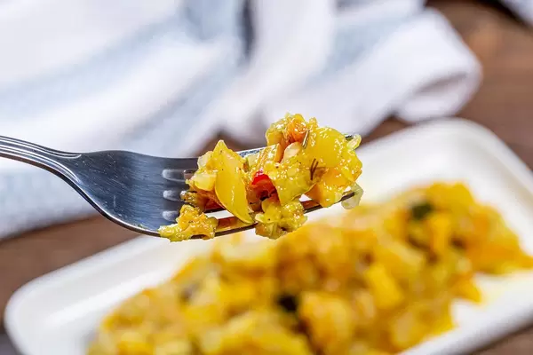 Closeup of a fork with vegetable stew