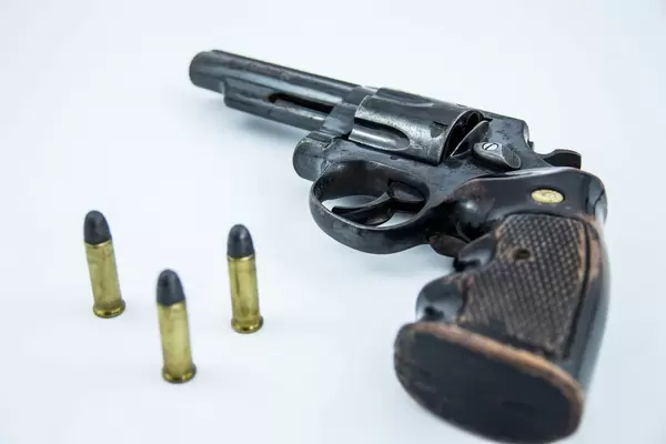 Closeup of a Revolver with Bullets