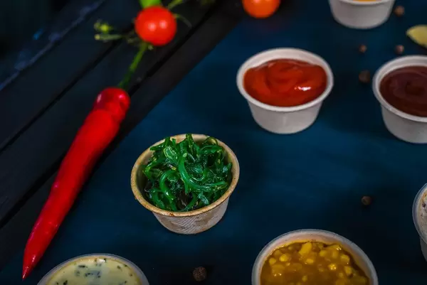 Closeup of appetizer sauces. spinach sauce (Flip 2019)