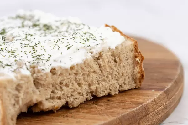 Closeup of Bread spreaded with Sour Cream (Flip 2019)