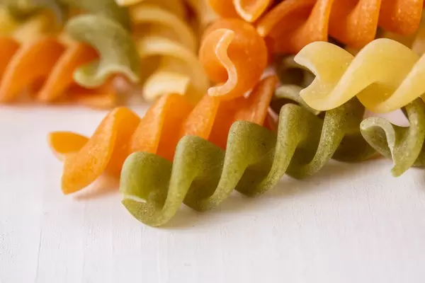 Closeup of Colored Pasta on the white background (Flip 2019)