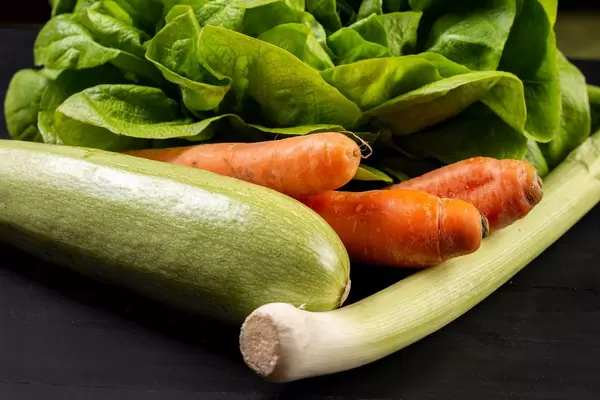 Closeup of Fresh Vegetables on the black table