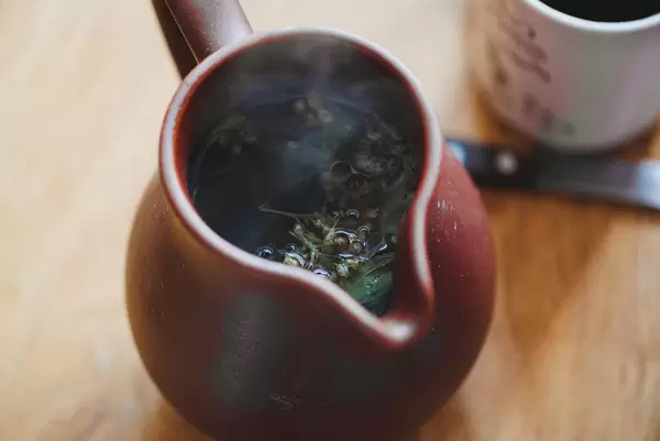 Closeup Of Hot Tea In Ceramic Teapot (Flip 2019)