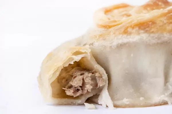 Closeup of Round Burek Pie with Meat (Flip 2019)