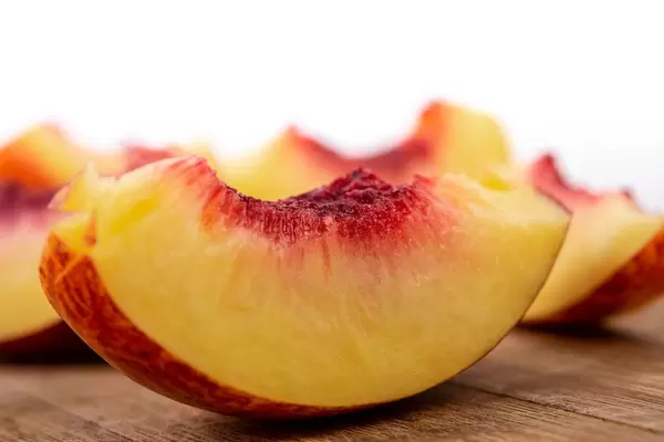 Closeup of Sliced Peach on the board (Flip 2019)