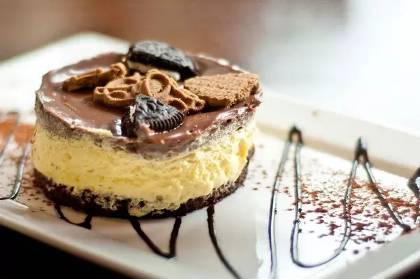 Closeup photograph of delicious chocolate dessert with cookies at a fancy restaurant