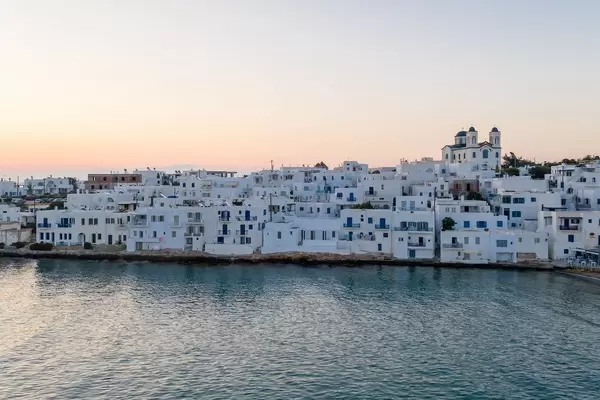 Coast of the picturesque port city Naoussa in the Mediterranean Sea, on Cycladic island Paros, Greece