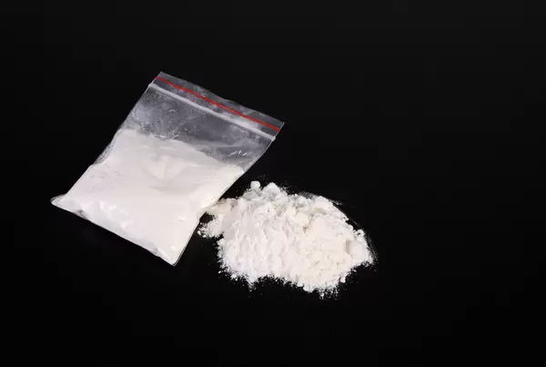 Cocaine on black table