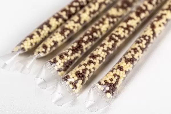 Cocktail tubes with chocolate and banana filling inside