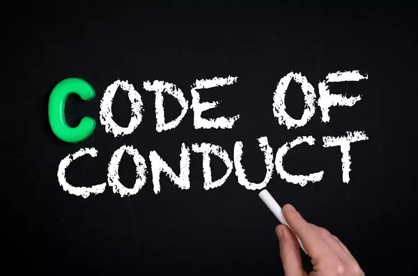 Code of conduct text on blackboard