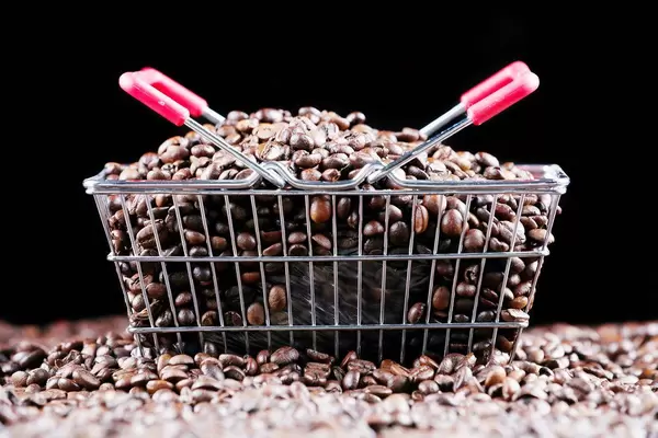 Coffee beans in a shopping basket, black background (Flip 2019)