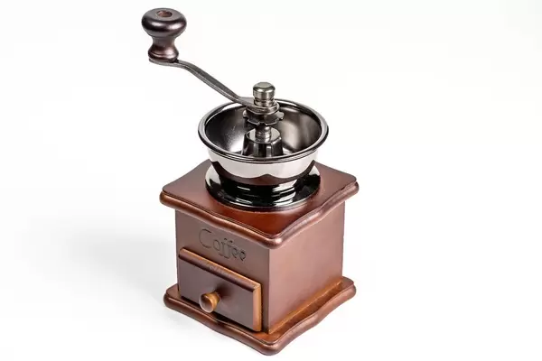 Coffee grinder on white background