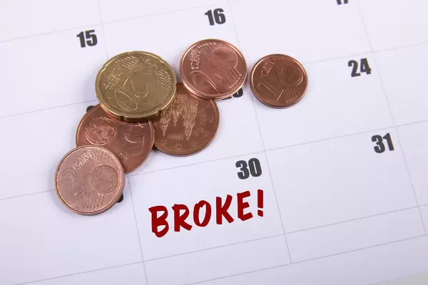 Coins and Broke text on the calendar