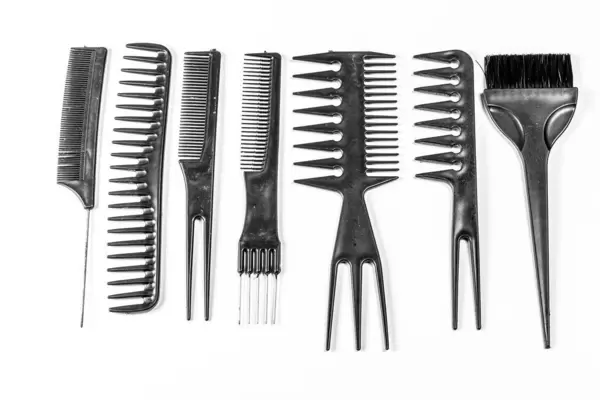 Collection of black combs on white background. Top view (Flip 2020)