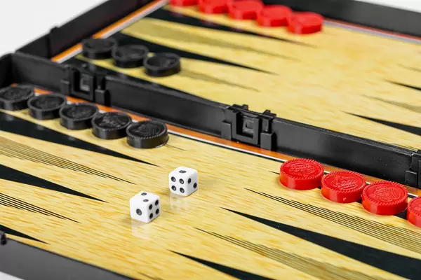 Color detail of a Backgammon game with two dice (Flip 2019)