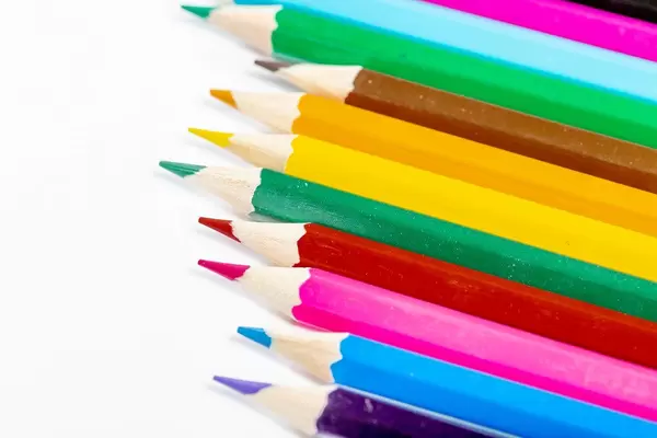 Color pencils on white background. Closeup