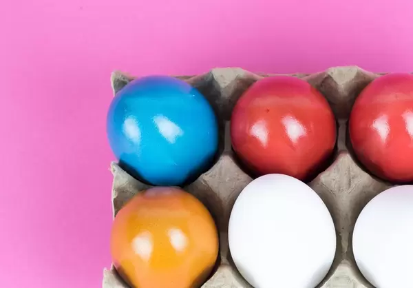 Colored Easter eggs in basket