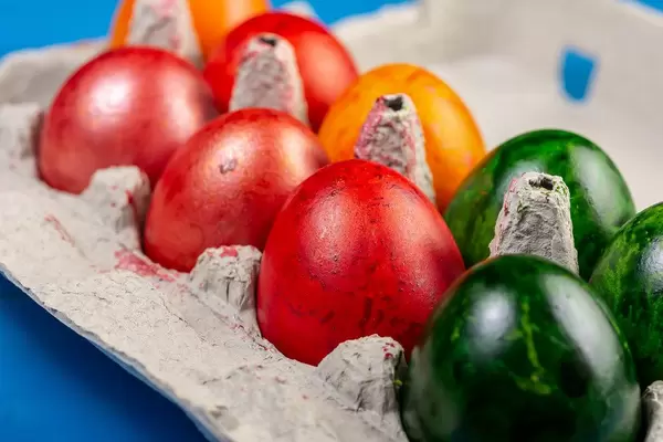 Colored Easter Eggs in cardboard box