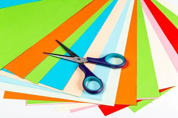 Colored paper and scissors - the concept of children's needlework