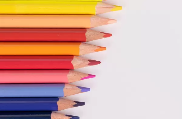 Colored pencils isolated on white background