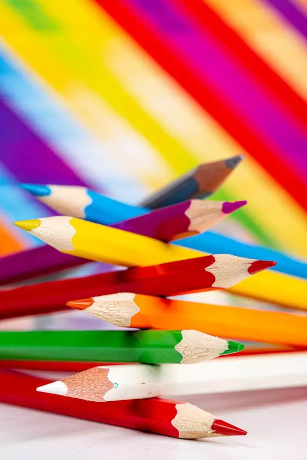 Colored pencils on a colorful background