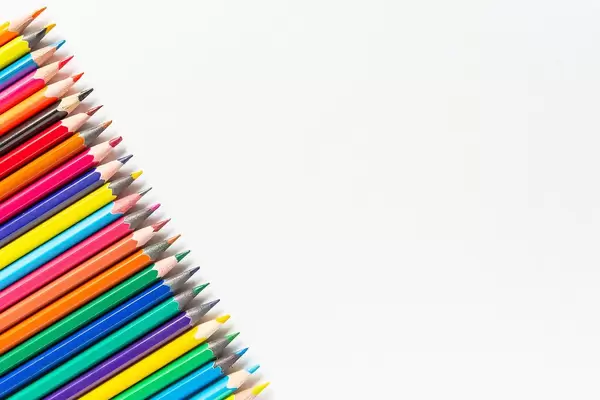 colored pencils on white paper background (Flip 2019)