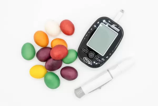Colorful candy and a blood sugar monitoring device