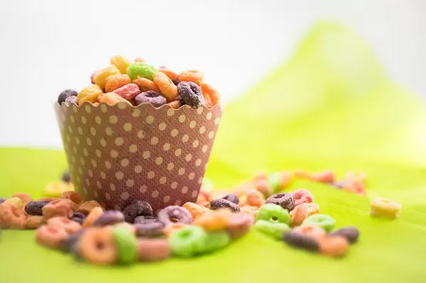 Colorful cereal on a pink cardboard cup (Flip 2019)