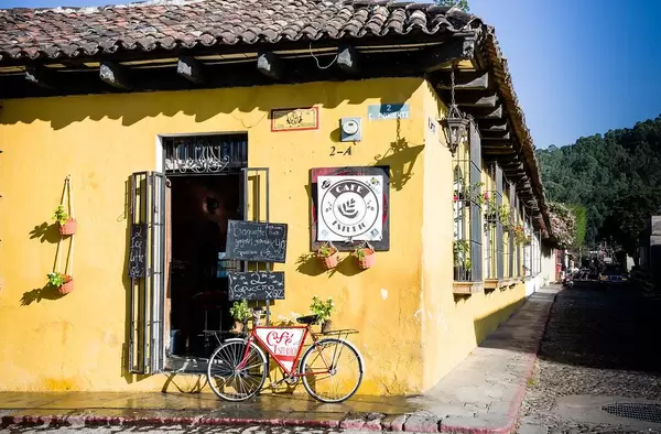 Colorful Coffee Shop at Street Corner with Beautiful Decorations in Antigua, Guatemala