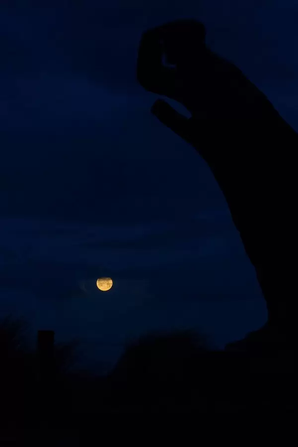 Colorful full moon in the distance