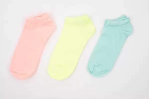 Colorful Kids Socks above white background