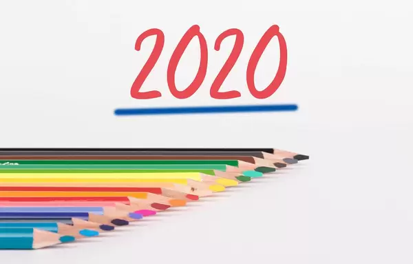 Colorful pencils on white background with 2020 text