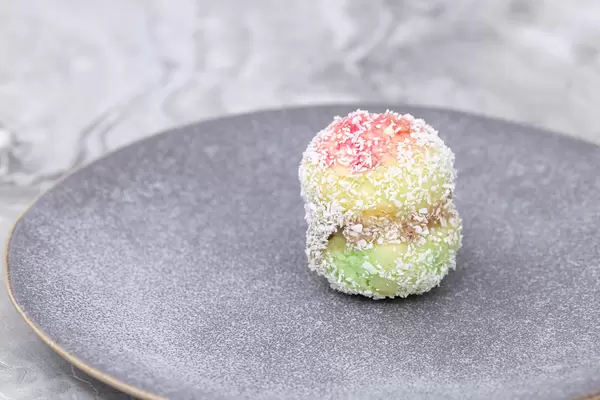 Colorful Round Cookie served on the grey plate