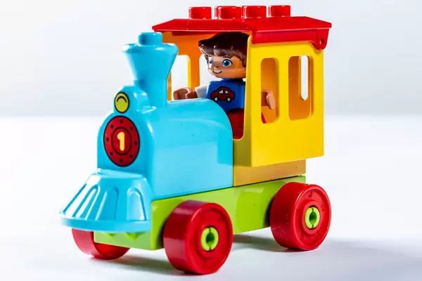 Colorful toy train on white