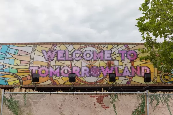 Colorful 'Welcome to Tomorrowland' sign welcomes the visitors of Tomorrowland at the entrance of the festival in Boom, Belgium