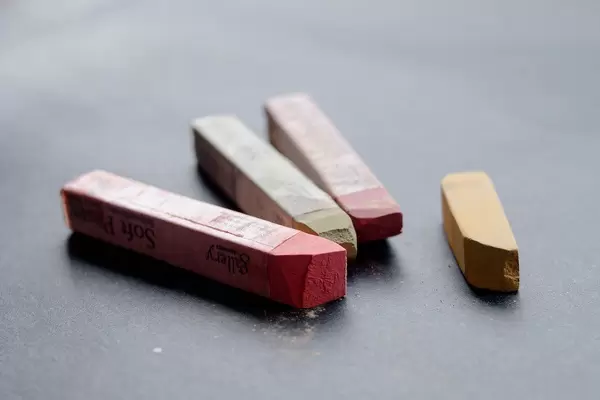 Coloured chalk on a rough surface