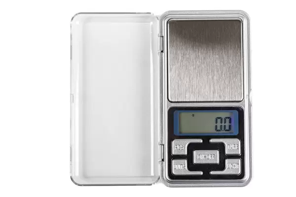 Compact and accurate jewelry weights on white background