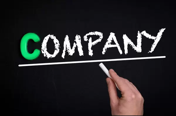 Company text on blackboard
