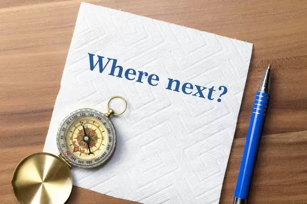 Compass with where next text