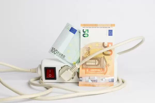 Concept of energy savings with money and electric splitter