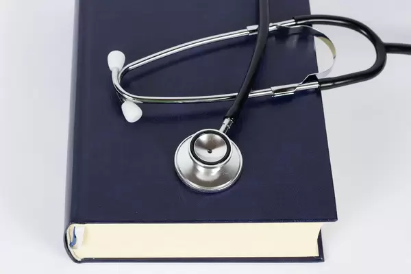 Concept of medical education with book and stethoscope