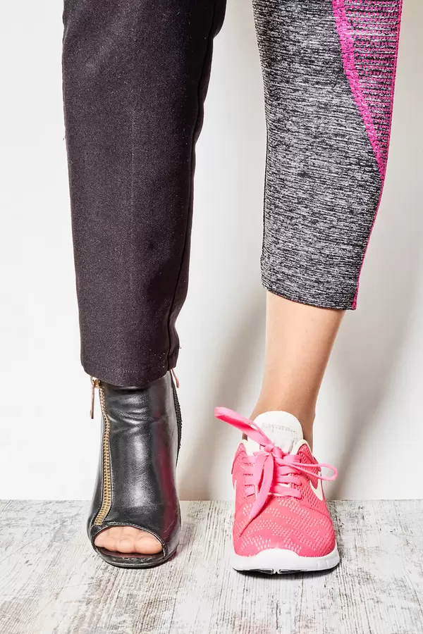 Conceptual photo of choice between the elegant office or comfortable sport wear