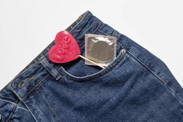Condom in jeans pocket