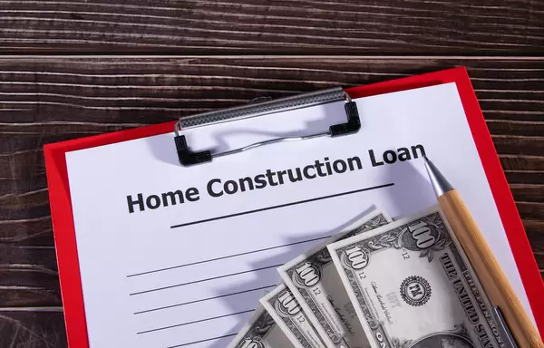 Construction loan form on a wooden table