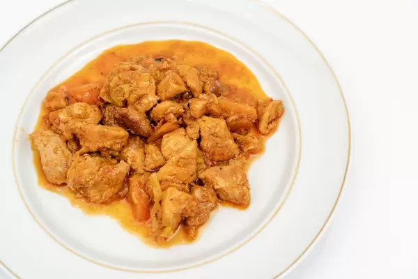 Cooked Beef Stew served on the white plate (Flip 2020)